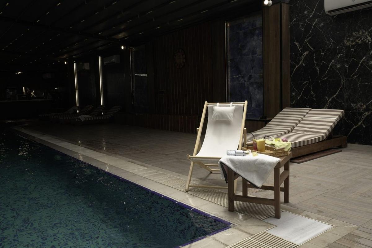 Pool loungers at La Mer