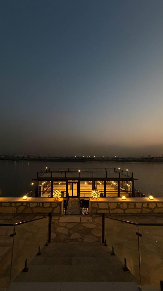 The riverside restaurant at dusk